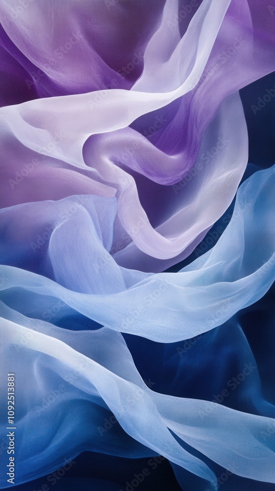 Delicate silk ribbons in various shades of purple and blue gracefully intertwine against a dark background, creating a calm and soothing visual effect that evokes tranquility.