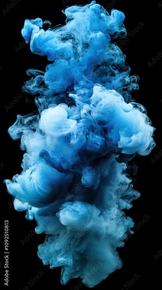 Swirling clouds of blue and white smoke create an abstract pattern against a deep black backdrop. The fluid movement of the smoke captures an ethereal quality, showcasing various hues.