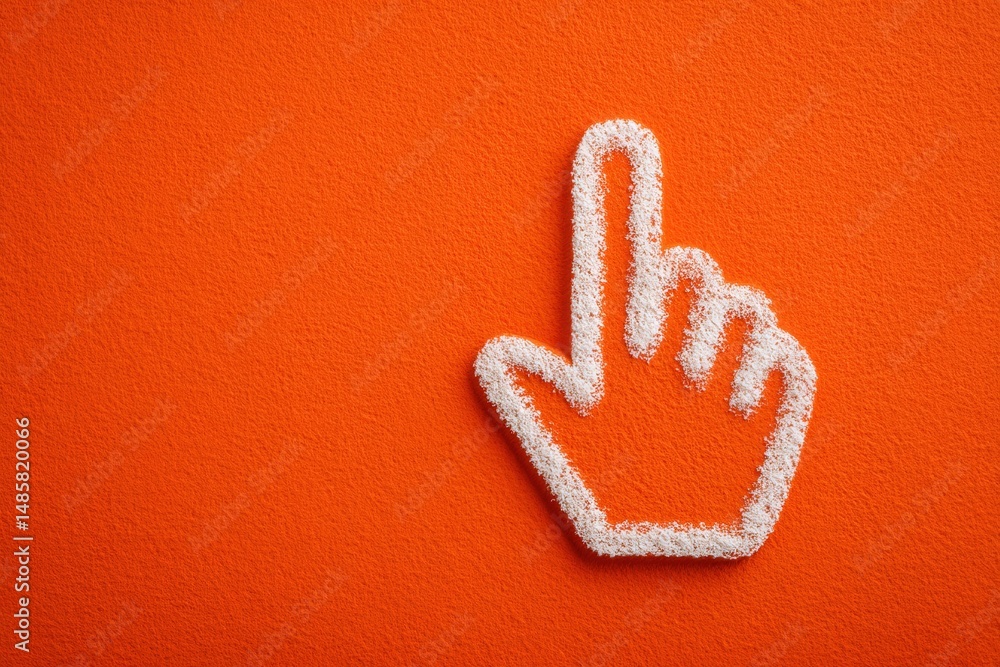 A hand gesture made of white material is prominently placed against a vibrant orange wall. The finger points upward, symbolizing focus or direction. This design creates a striking visual.