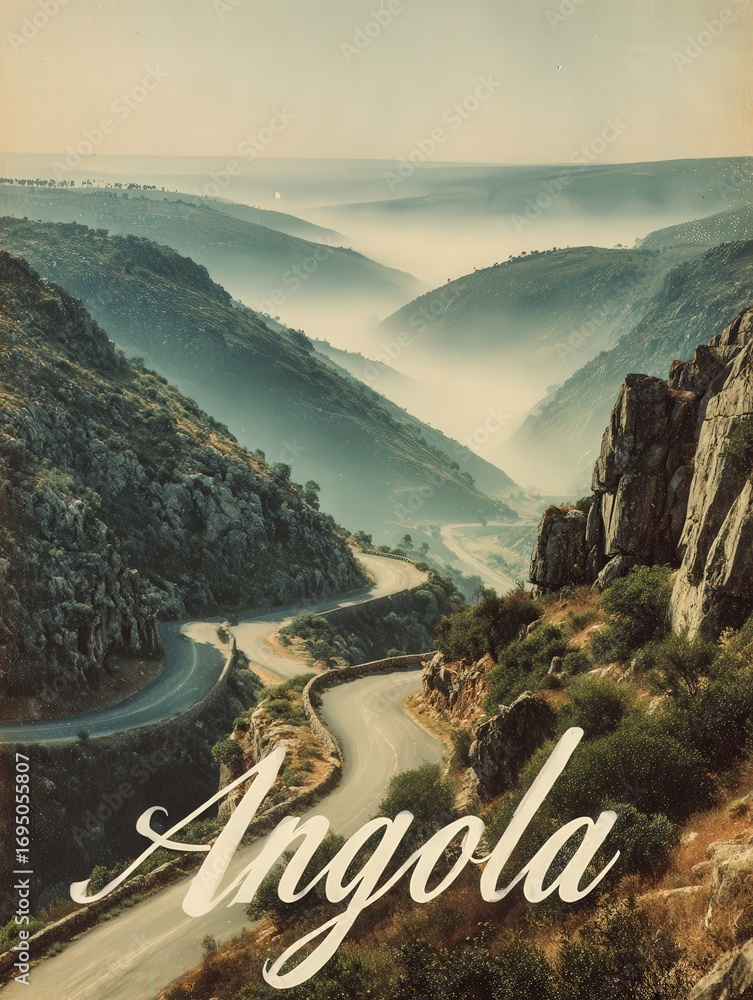A winding road curves through misty valleys and mountains in Angola, creating a picturesque view at dawn. The landscape features rocky hills and lush vegetation with soft fog covering the terrain.