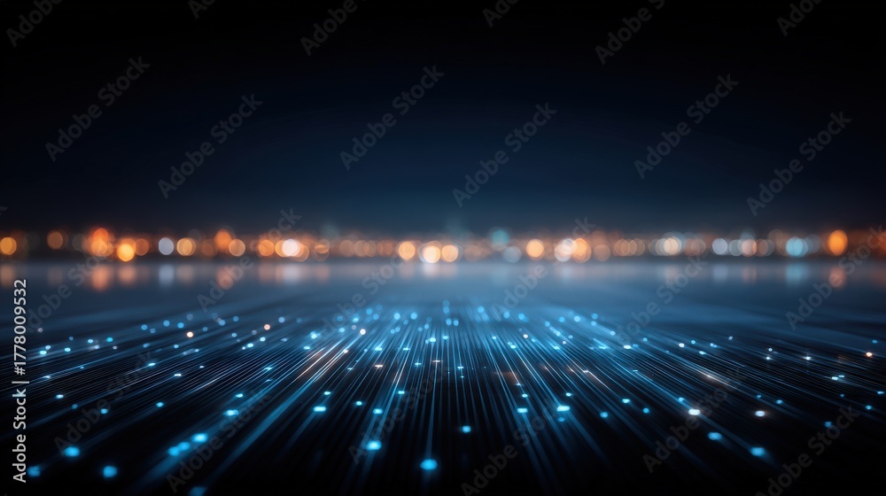 Bright blue light patterns create a mesmerizing effect against a dark background, reminiscent of stars. The scene captures a city skyline with glowing points reflecting an urban atmosphere at night.